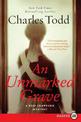 An Unmarked Grave: A Bess Crawford Mystery LP