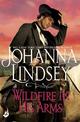 Wildfire In His Arms: A dangerous gunfighter falls for a beautiful outlaw in this compelling historical romance from the legenda